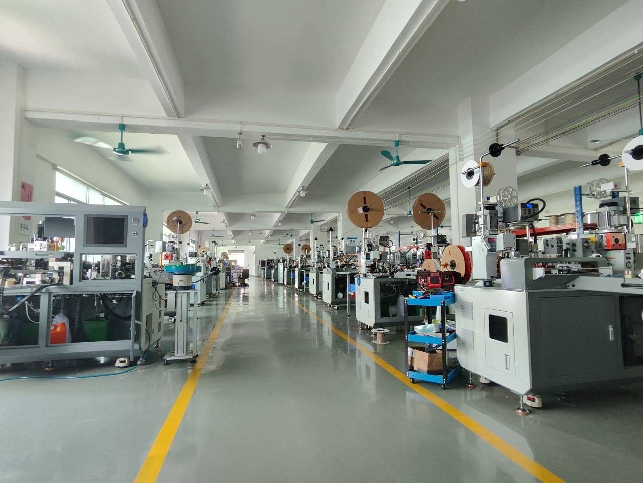 Housing-insertion terminal crimping machines assembled inside the Turingnex factory in Dongguan