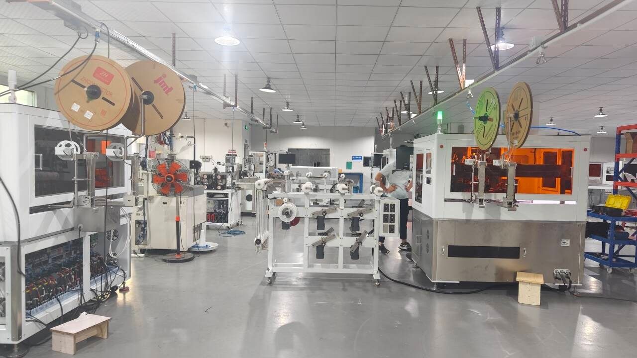 Turingnex factory — Automation line under operator monitoring